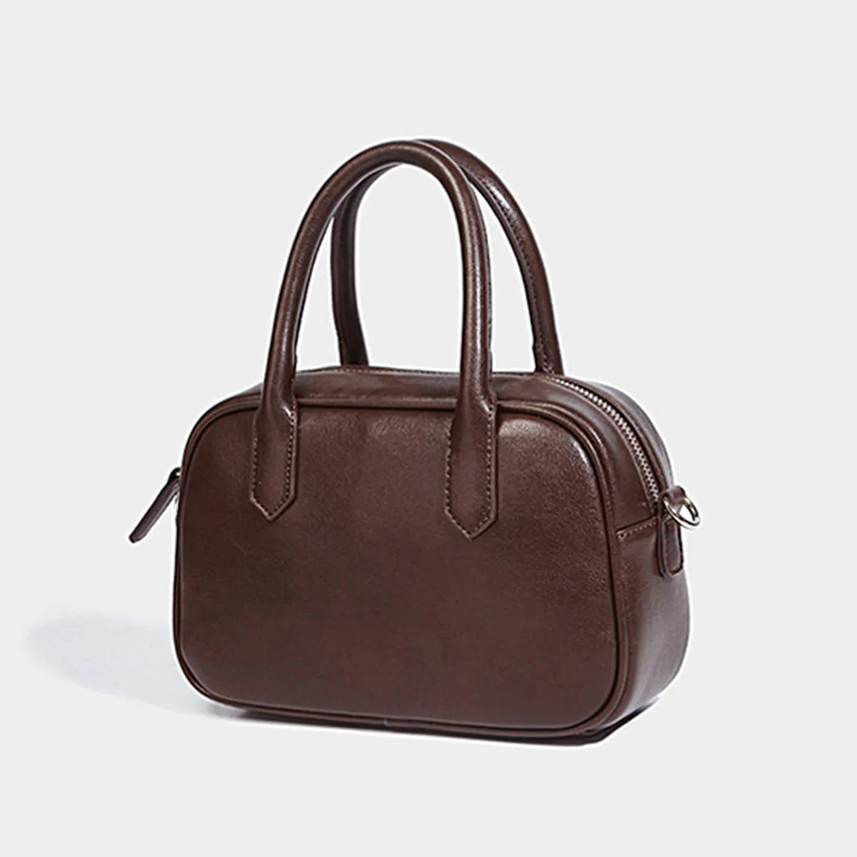 Retro square shoulder messenger bag in black PU leather with a single strap.