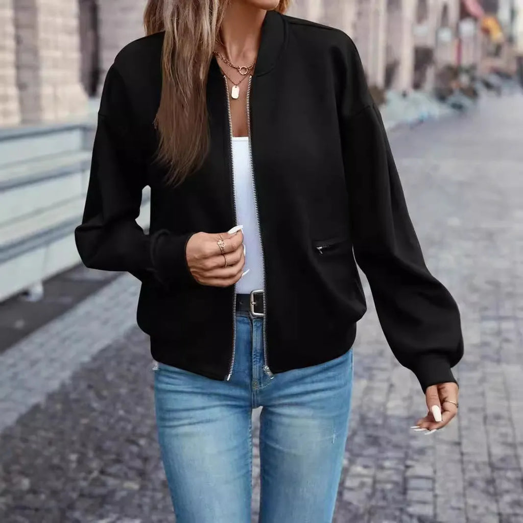 Black women's long sleeve zip jacket with faux pockets for casual autumn winter wear.