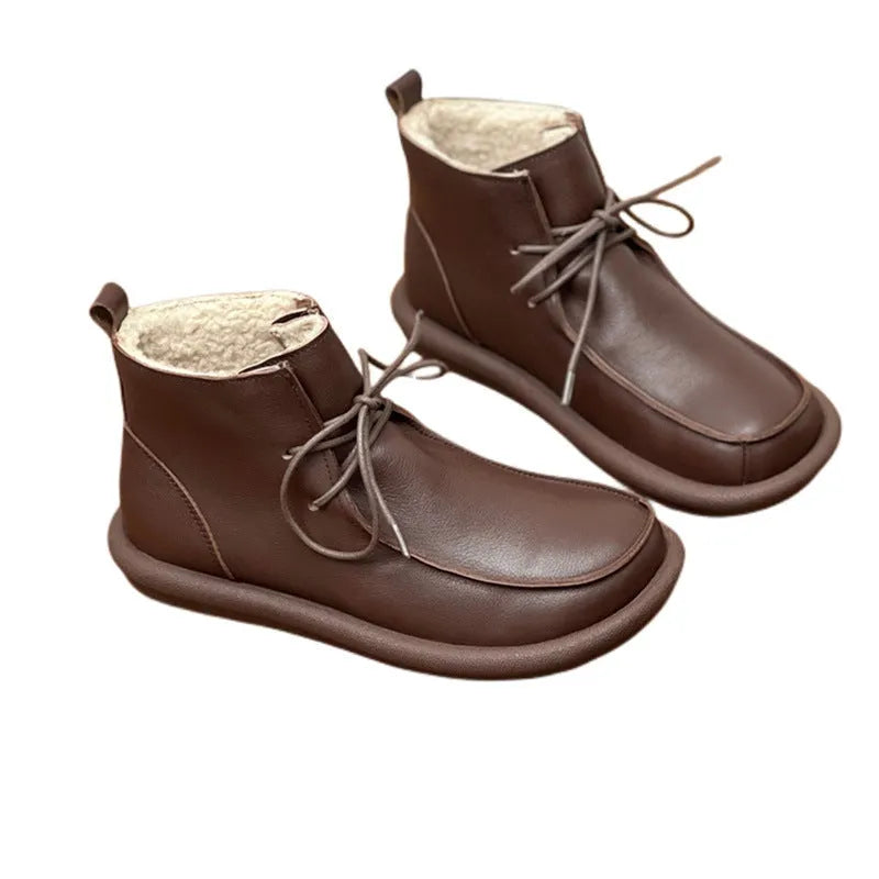 Women's cowhide casual boots with round toe and flat heel in black colour option