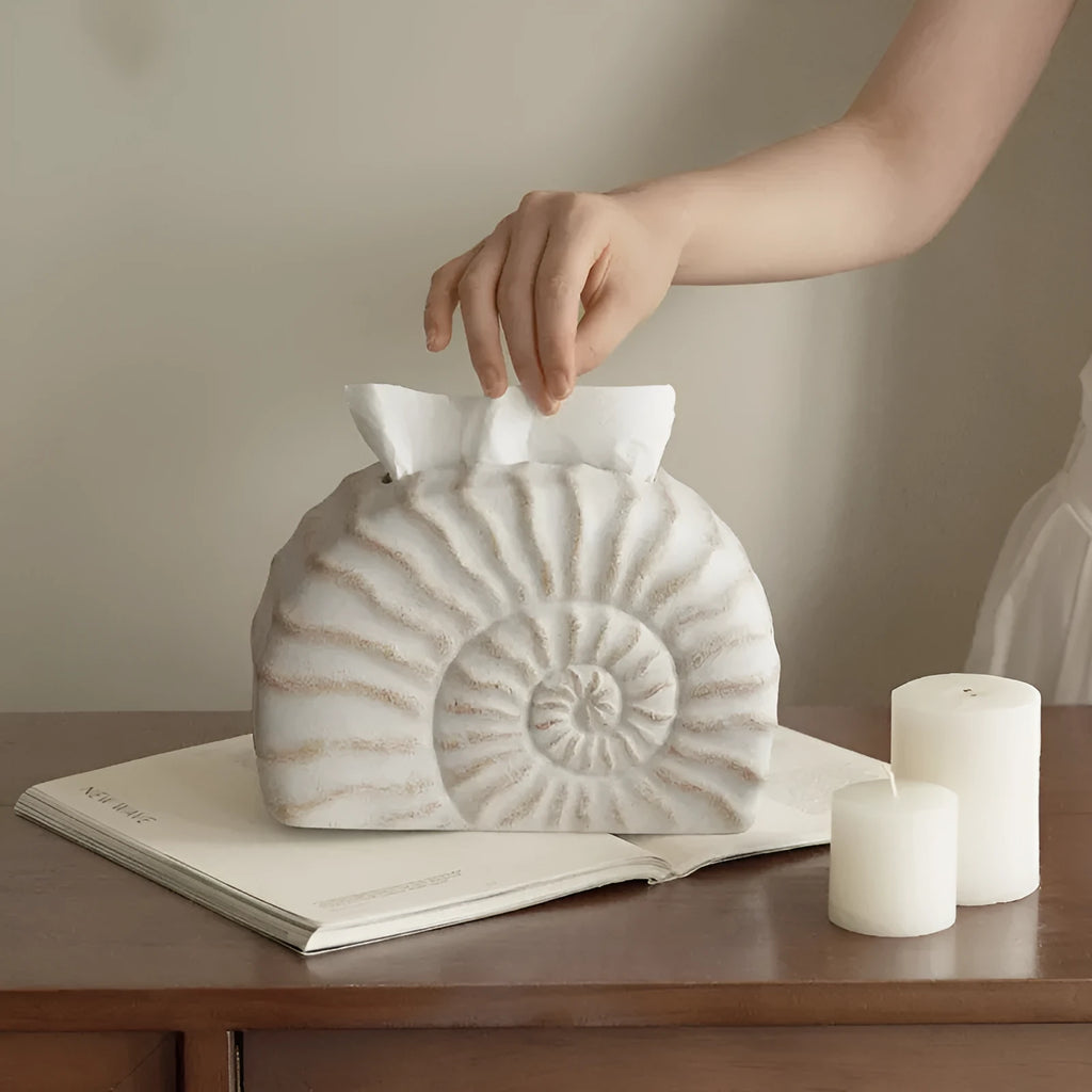 Resin conch ramble decorative tissue box cover with seashell design.