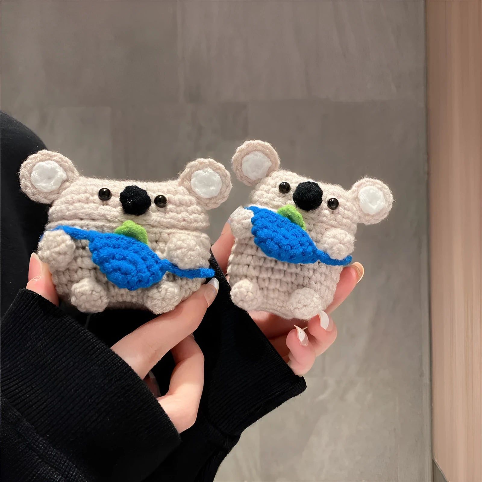 Handmade knitted koala bear backpack design protective sleeve for Apple AirPods case.