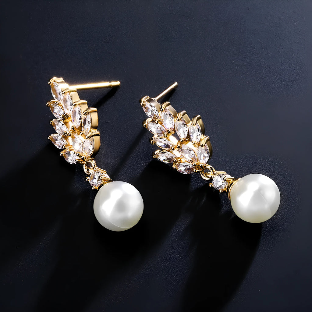 Geometric floral design earrings with micro inlaid zircon, available in white gold, rose gold, and platinum plating.
