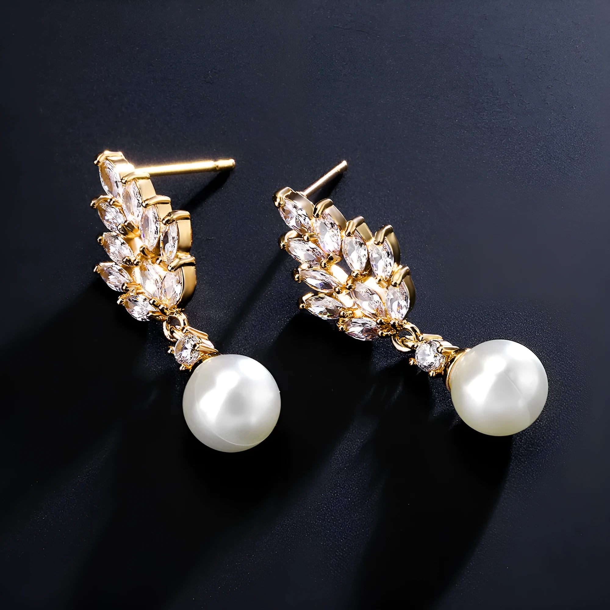 Geometric floral design earrings with micro inlaid zircon, available in white gold, rose gold, and platinum plating.