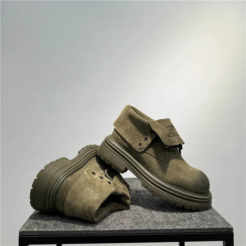 Distressed cow suede worker boots with thick soles and retro sewing detail in camel colour