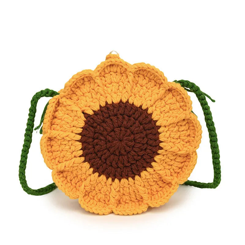 Round hand-woven wool crochet bag with floral detailing and cotton lining in colour options