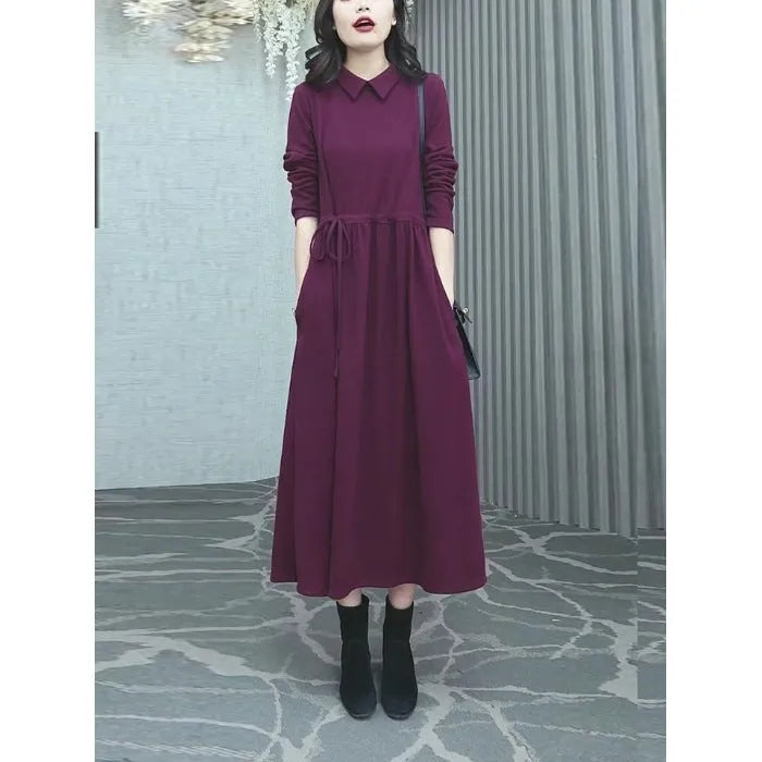 A purplish red plus size long dress with long sleeves for women in autumn and winter.