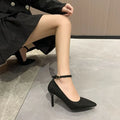 Women's black stiletto heel pump shoes with buckle detail on side