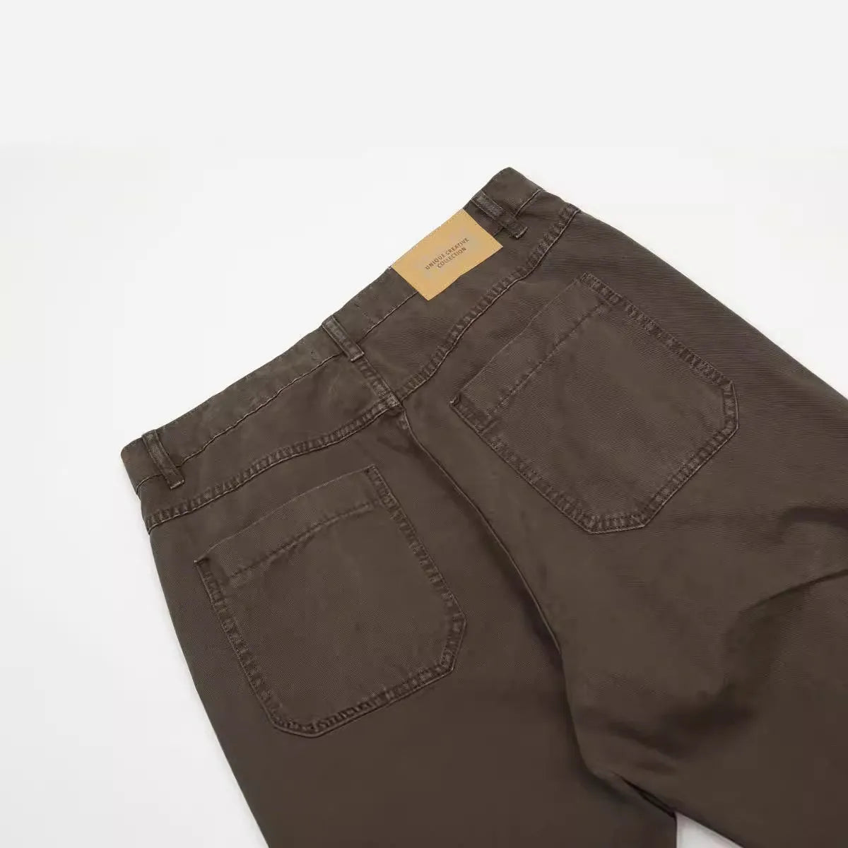 Men's brown loose straight-leg trousers with high waist and zipper fly