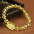 Yellow leather cord Pi Xiu bracelet with artificial crystal citrine beads in simple Chinese style