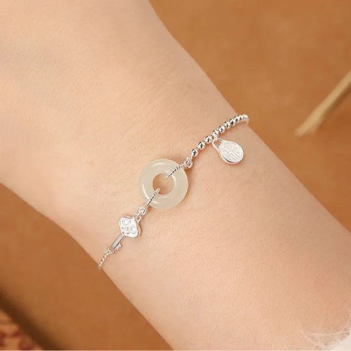 Women's 925 silver Hetian jade bracelet with geometry shape and Ruyi Xiaofu design