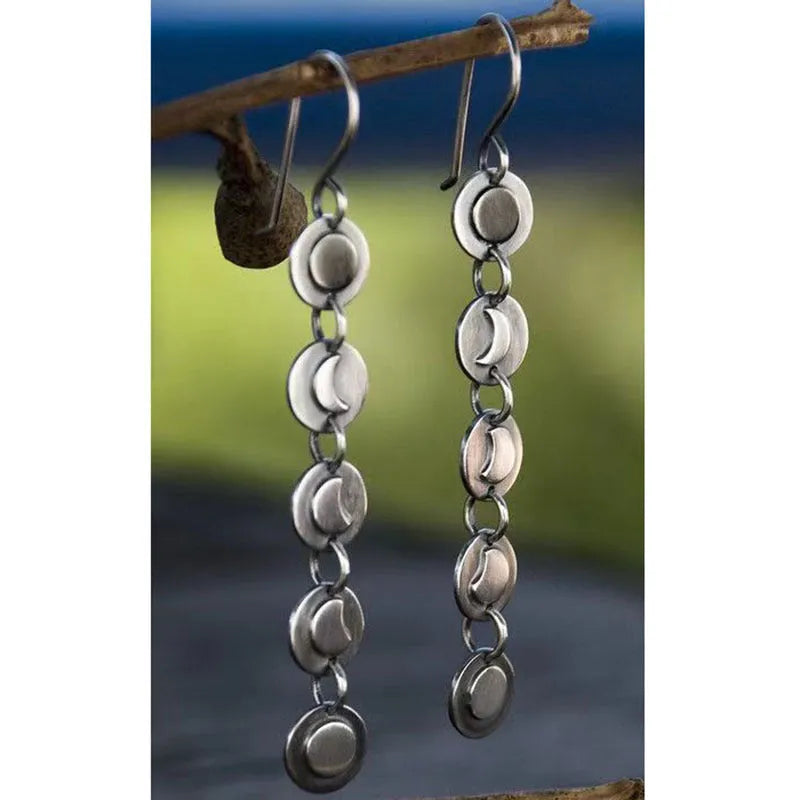 Geometric disc handmade moon long earrings in silver colour on alloy base, drop dangle style for women