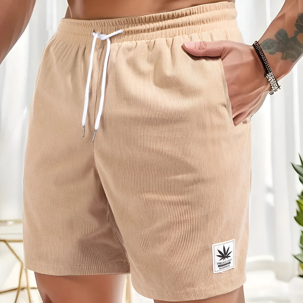 Men's black drawstring summer shorts with straight leg on a mannequin