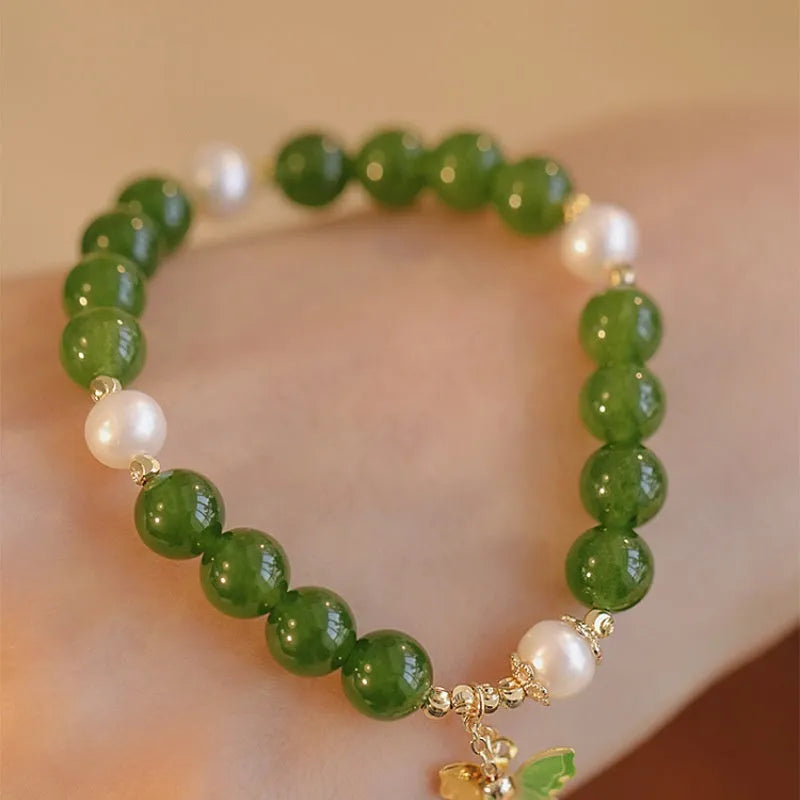 Natural green chalcedony bracelet with round beads and minority design elements for women