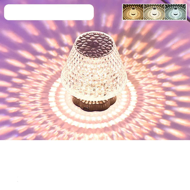 Crystal table lamp with touch base and LED lighting on wooden surface