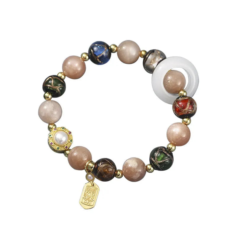 Hand-woven fragrant grey coloured glaze bracelet with sunstone or white lip shell beads