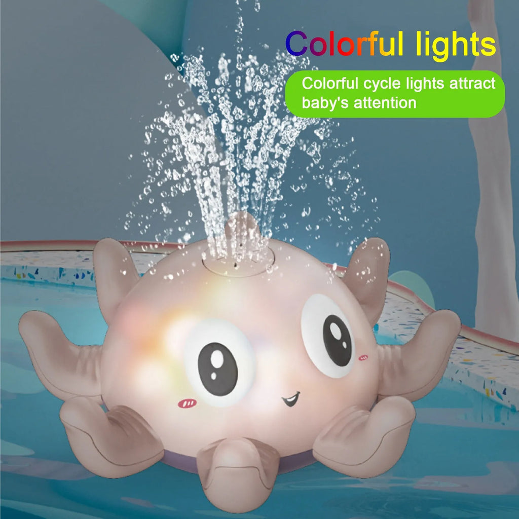 Automatic water spray bath toy with flashing lights in pink or blue colour for children's bath time