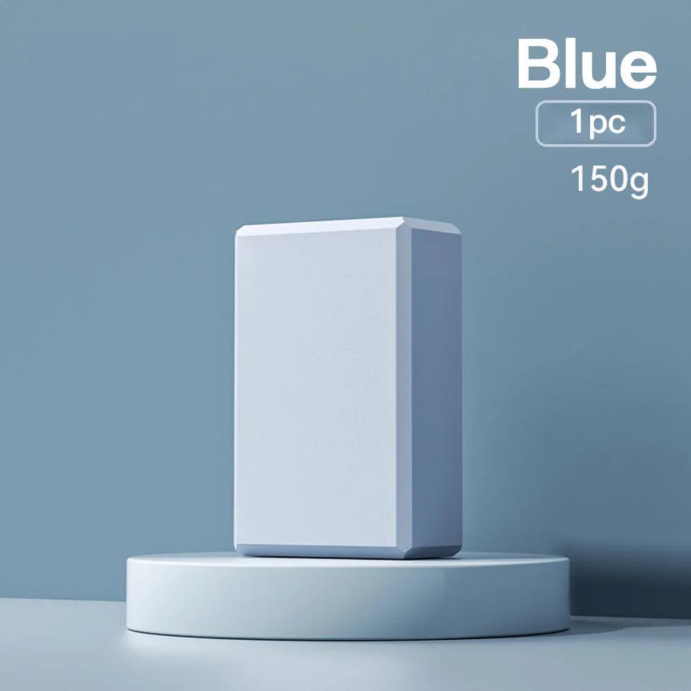 High-density EVA foam yoga block measuring 23x15x7.6cm with twelve grip ridges in solid colour