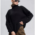 Women's thick imitation cashmere pullover sweater in loose fit with high neck and regular long sleeves
