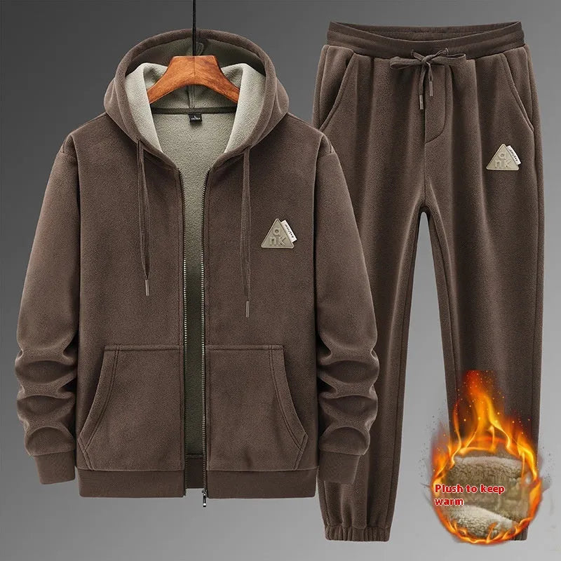 Grey cashmere hooded sweater and cotton pants two-piece sports suit laid flat.
