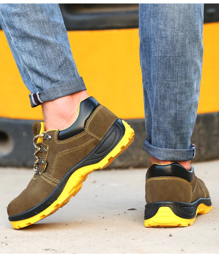 Bronze cow suede unisex safety work boots with a steel toe cap and patterned non-slip sole.