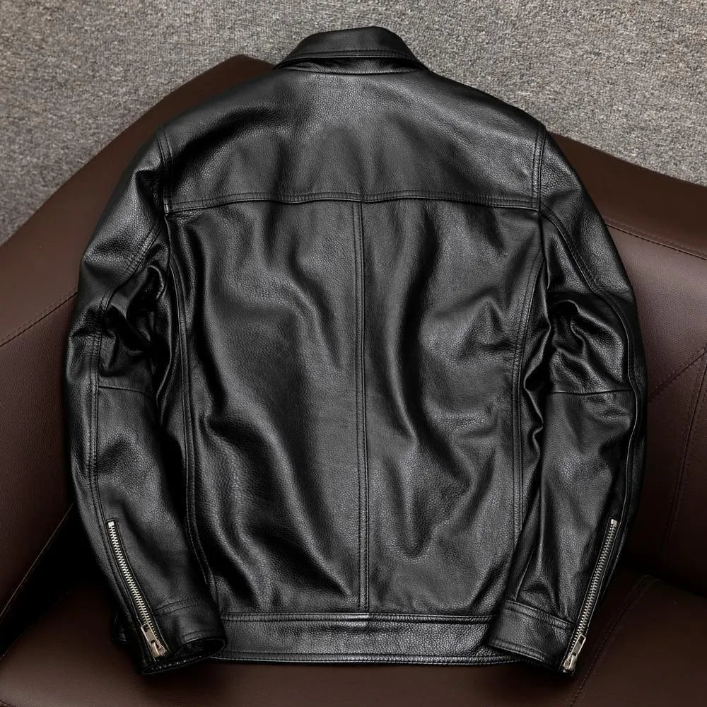 Men's black retro-style leather jacket with side pockets showing loose fit design