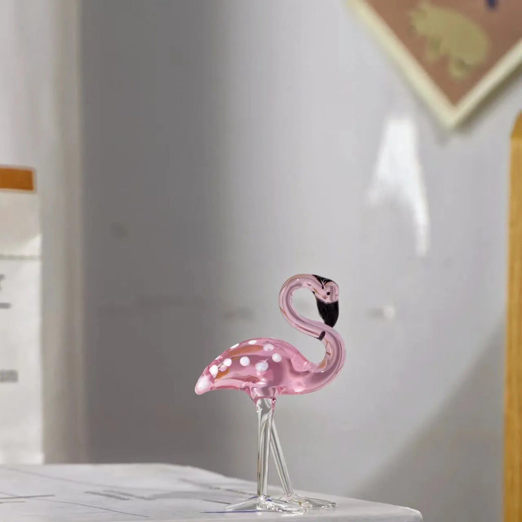 Pink crystal flamingo decorative ornament on table with modern simple design