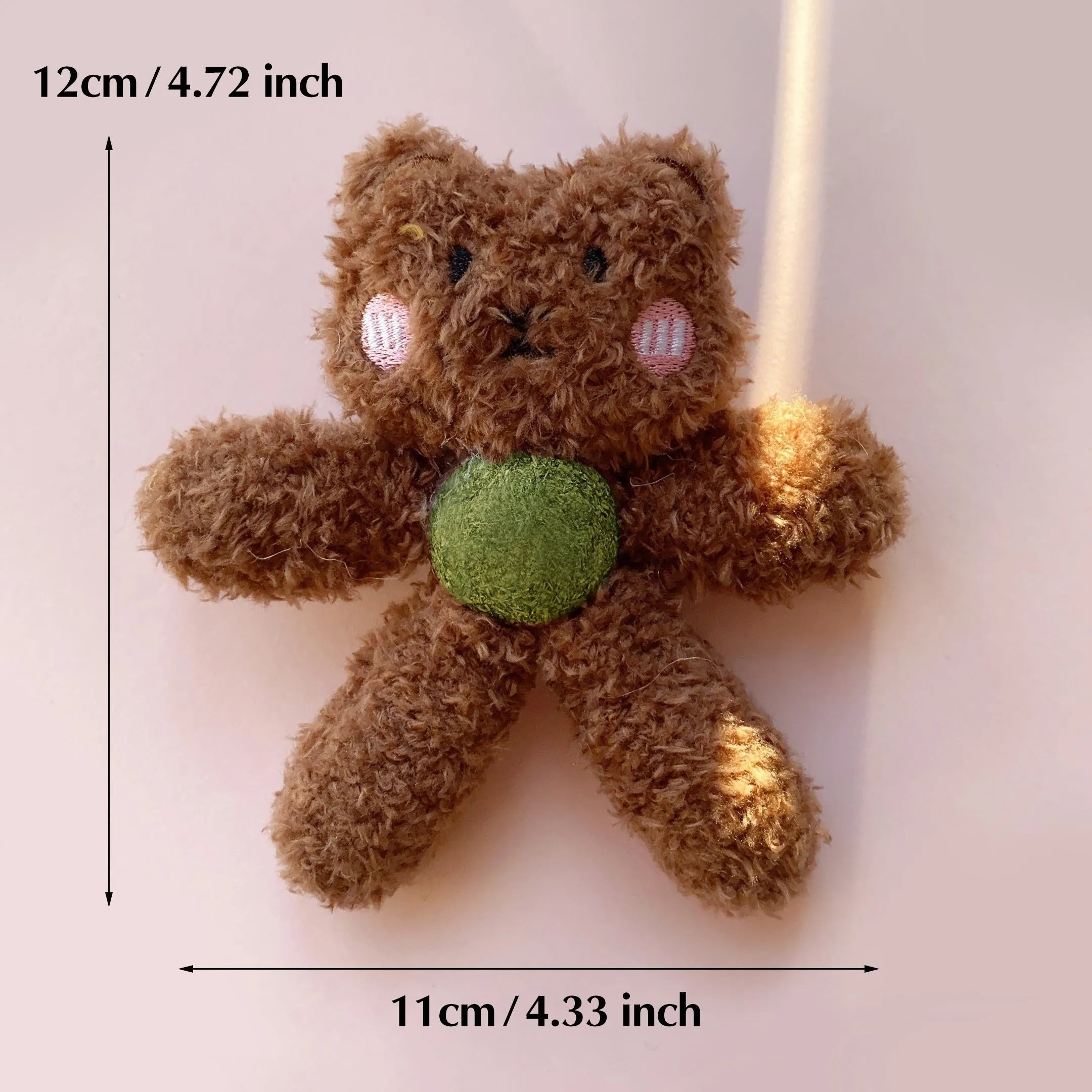 Interactive catnip ball toy with edible catnip stuffing for kitten dental care in character designs