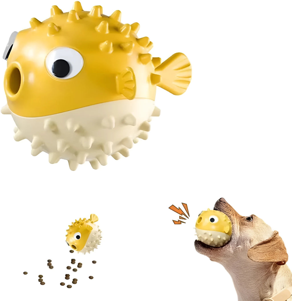 Green fish-shaped dog toy with treat dispensing opening and textured surface for dental cleaning