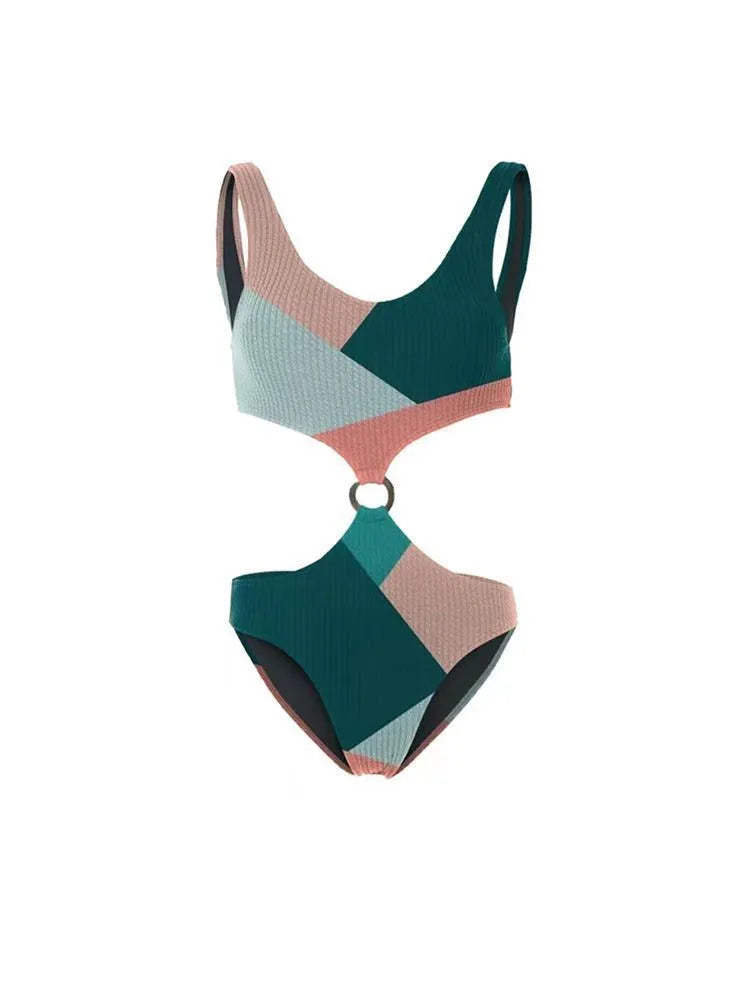 Contrast colour bikini two-piece set with a light mesh gauze skirt laid flat.