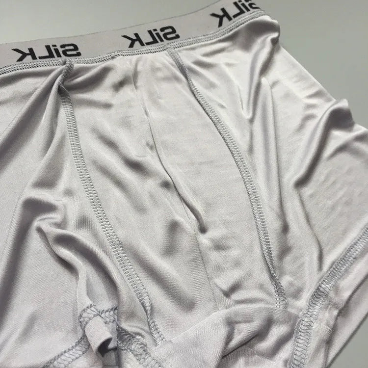 Men's loose fit silk shorts in navy blue with mid-waist design