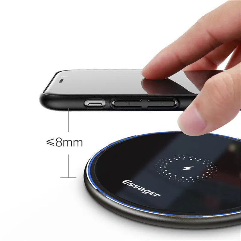 Black wireless charging pad with LED indicator light on aluminium alloy surface