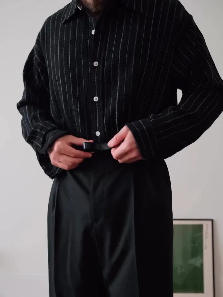 Black pinstriped button-down polyester shirt with regular fit on mannequin