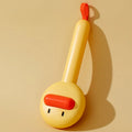 Small yellow duck comb for cat and dog hair removal with open section design