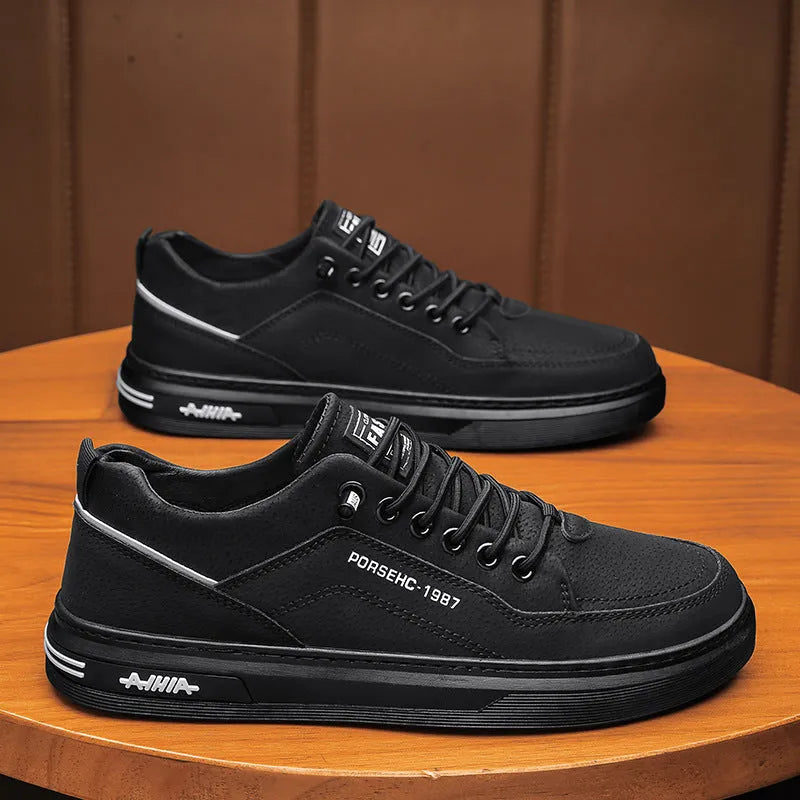 Men's black construction casual shoes with non-slip rubber soles and round toe design