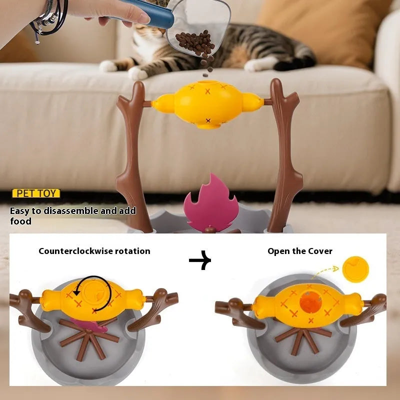 Barbecue-style plastic tumbling cat feeder toy for dispensing freeze-dried treats.