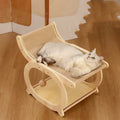 Solid wood cat scratching bed with sisal mat in walnut colour.