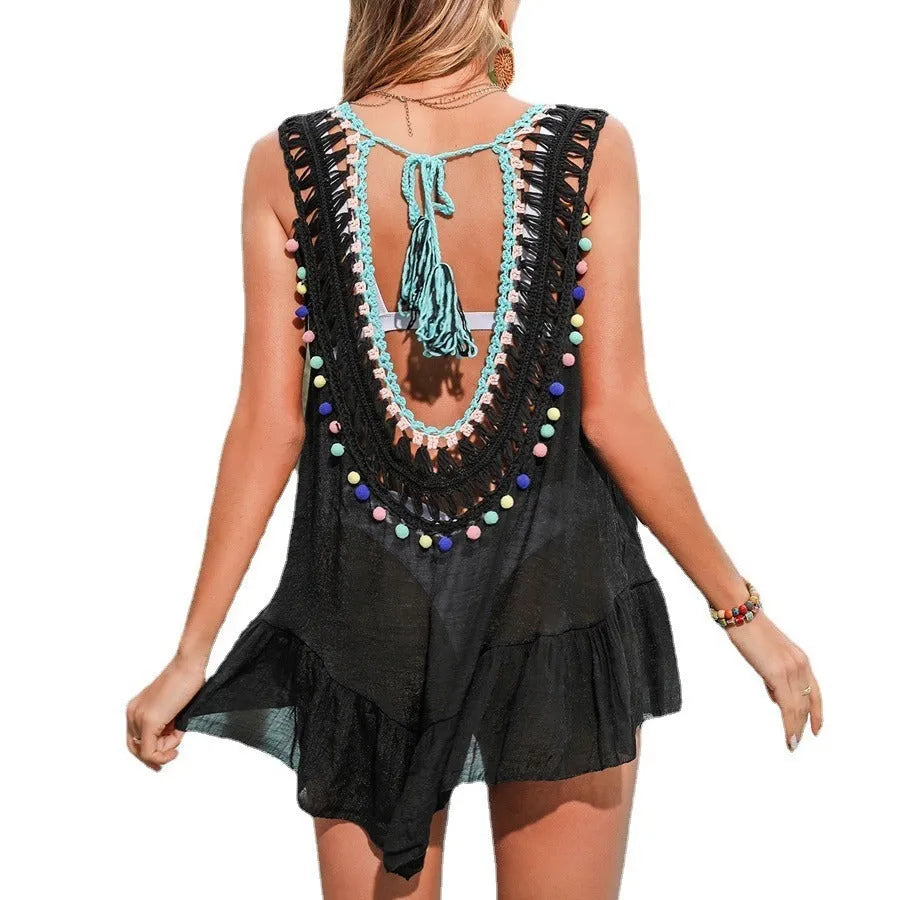 Black hand-crocheted acrylic beach cover-up for women with a ruffled design.