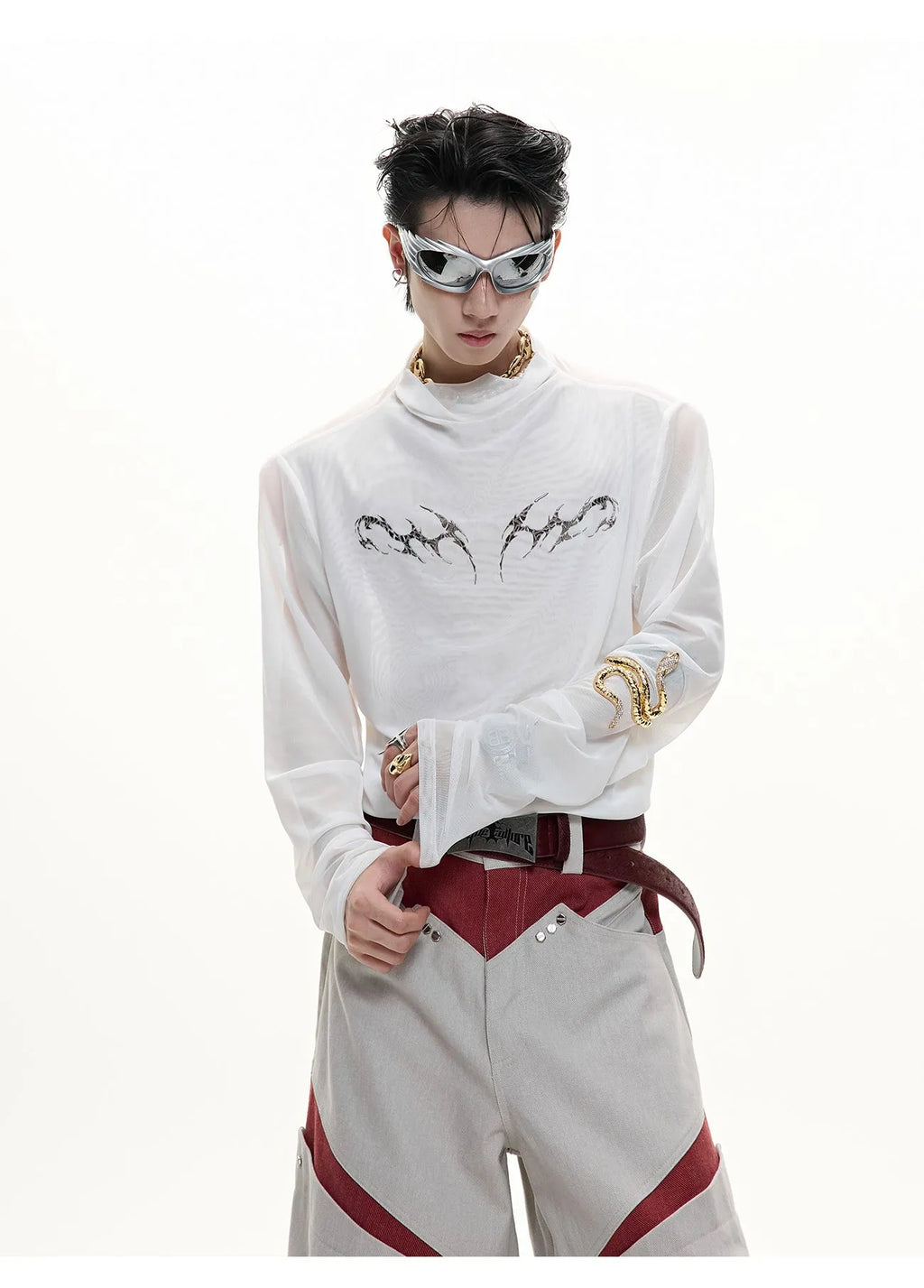 Man wearing a black slim fit long sleeve ice-feel top made from polyester and spandex blend.