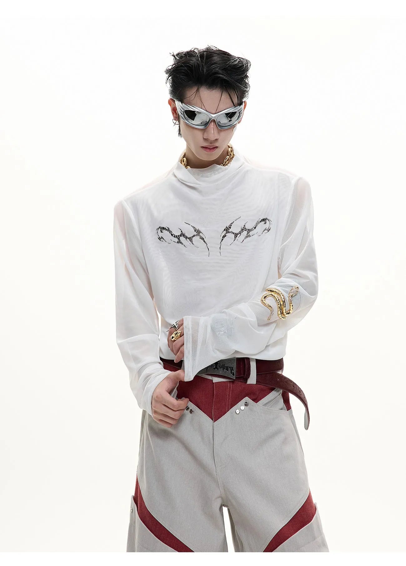 Man wearing a black slim fit long sleeve ice-feel top made from polyester and spandex blend.