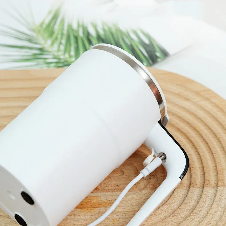 White electric automatic magnetic stirring mug with LCD temperature display on black base