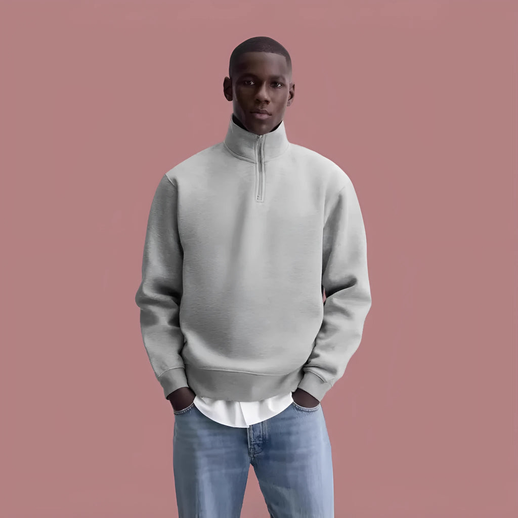 Grey cotton half zip stand collar sweater with long sleeves on mannequin