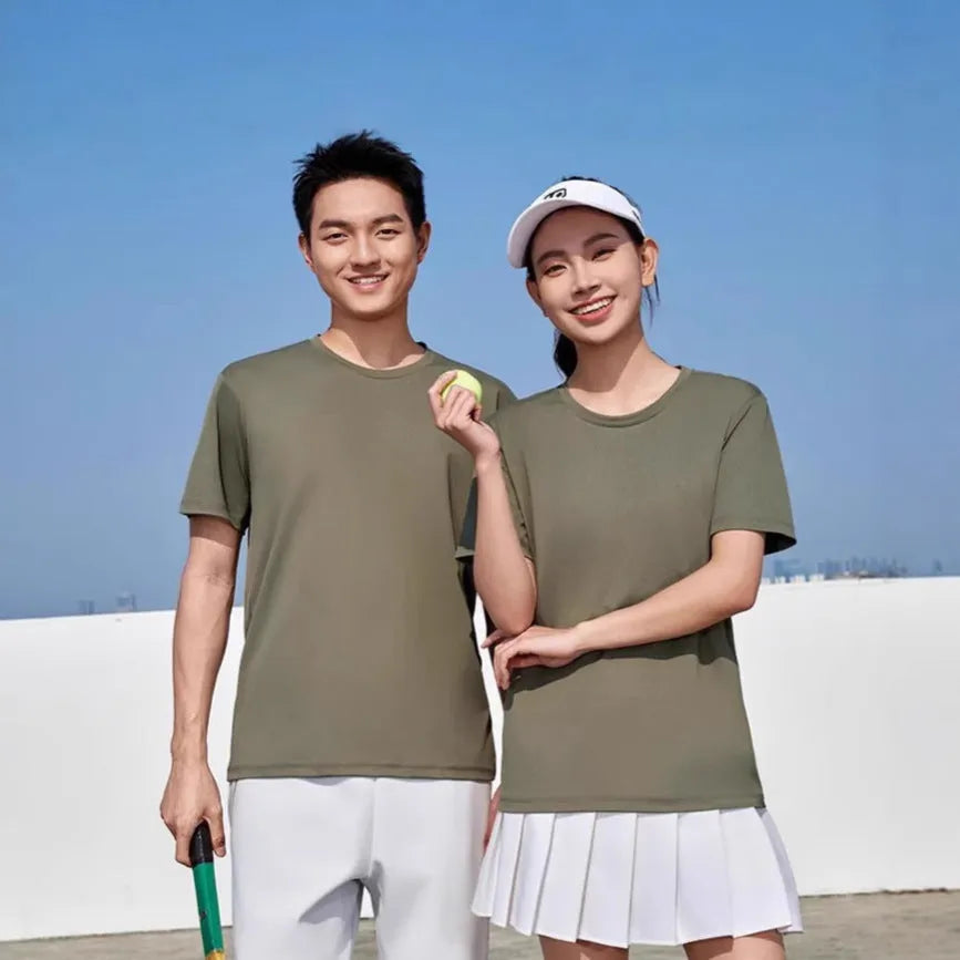 Men's solid colour loose fit short sleeve polyester t-shirt on a hanger.