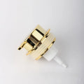 Large pump head facial cleanser foam bottle in metallic gold, silver, or matte black colour options