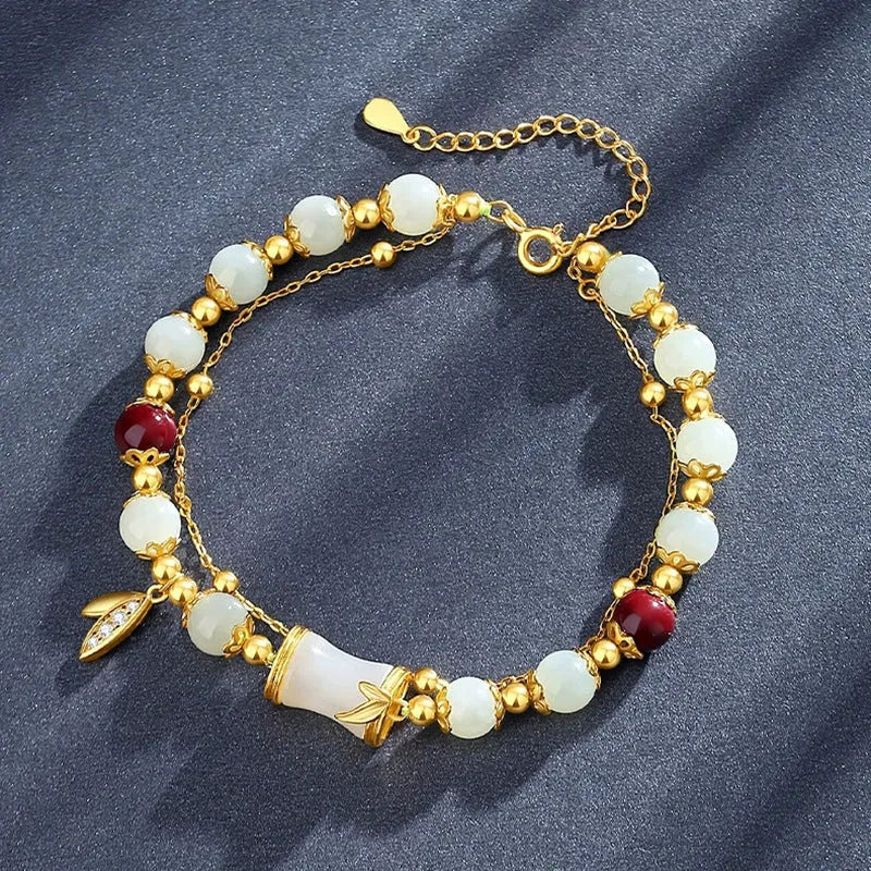Retro style Ruyi floral bracelet made from coloured glaze and glass in beige, green, light green, or white.
