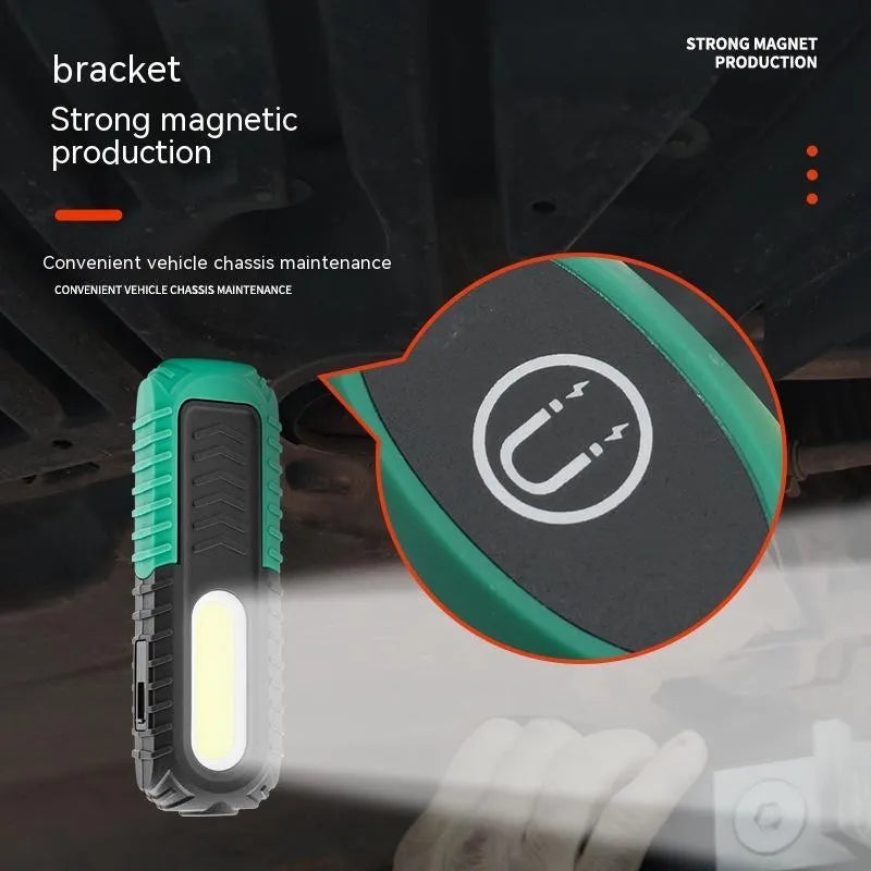 Black and green USB-charged auto repair work light with compact design for vehicle maintenance