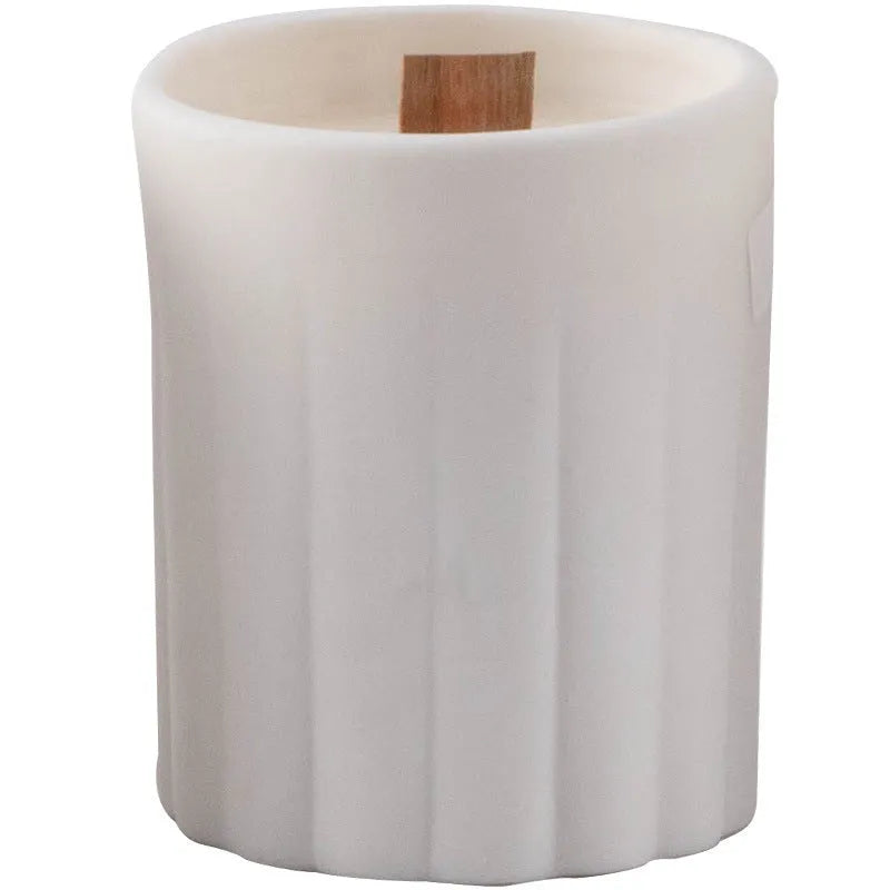 Minimalist relief ceramic candlestick round shape semi-handmade on dining table