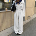White striped wide-leg polyester pants with zipper, loose fit for commuting
