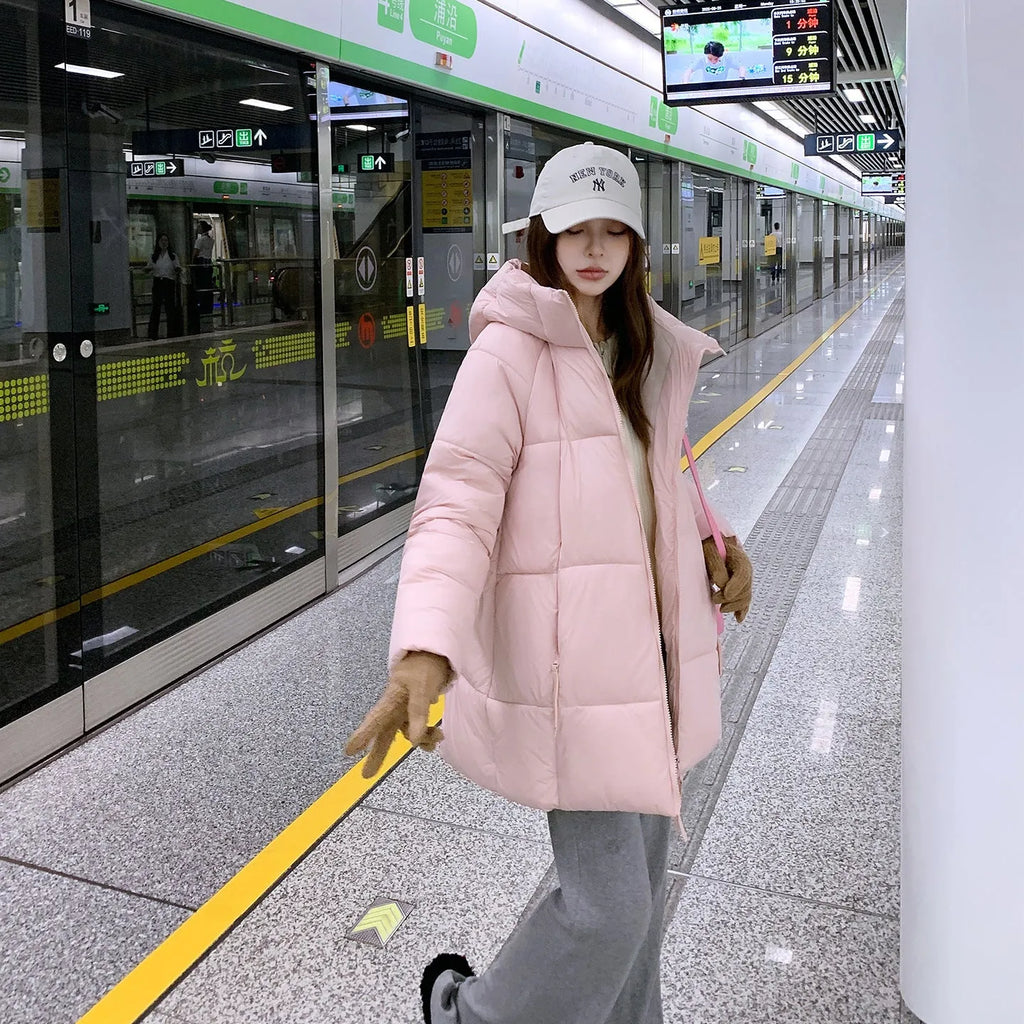 Women's winter loose mid-length down thickened cotton coat in solid colour with pockets, available in multiple colours