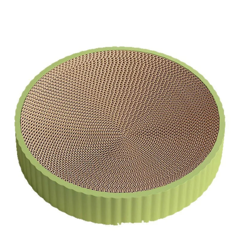 Round green and white corrugated paper cat scratching board and nest, 55cm diameter, with replacement refills.