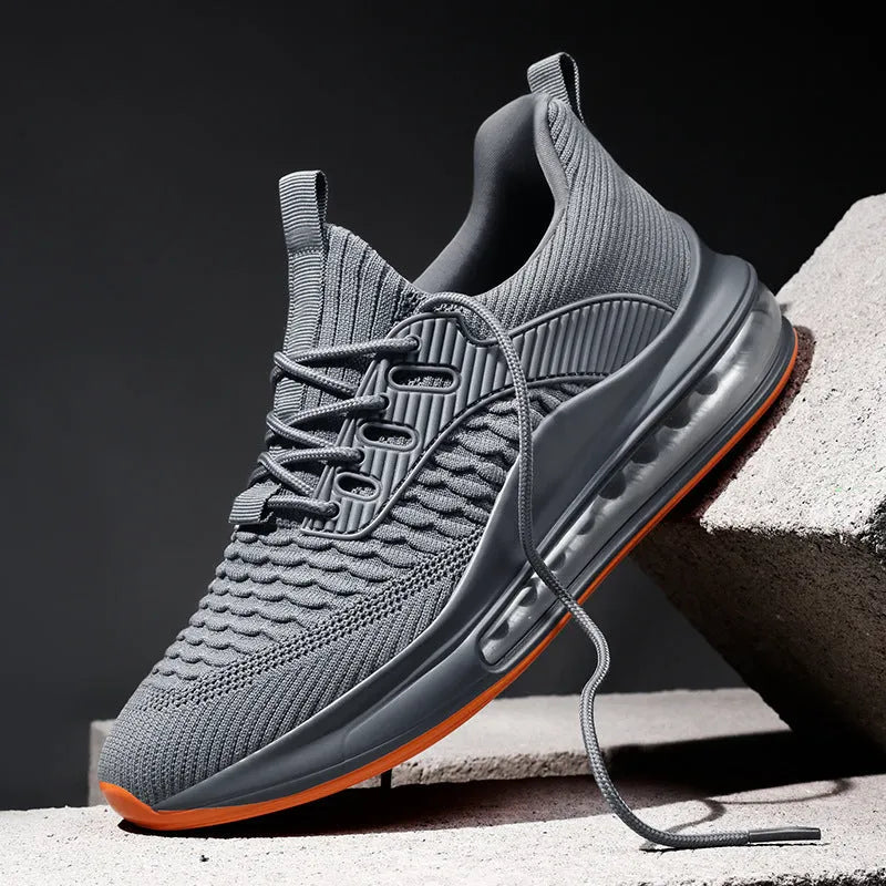 Men's black mesh running shoes with lace-up front and rubber sole on a white background